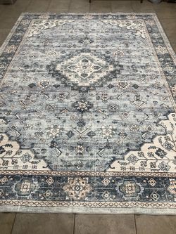 Pretty blue 9x12 washable area rug
