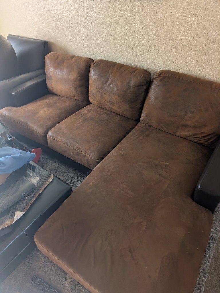 Brown and black 84" faux leather couch