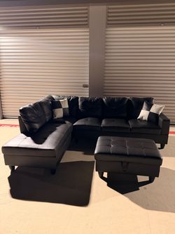 Black sectional with ottoman