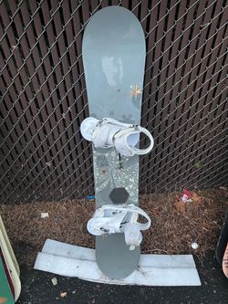 Snowboard with White Bindings