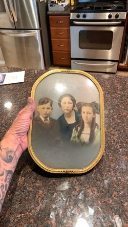 Beautiful 1920s gold plated frame and bubble glass can stand or wall hang