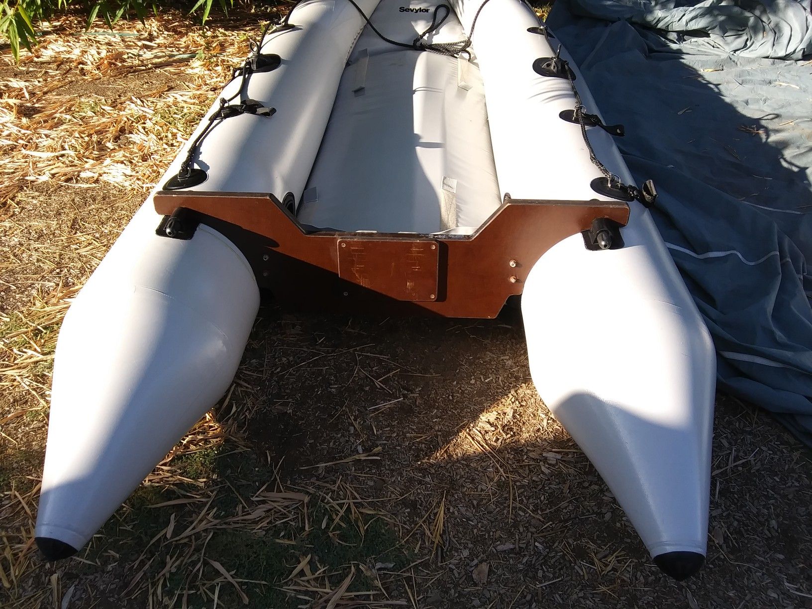 Inflatable fishing boat. Selling for $260 firm a 10' Sevylor model boat . has no leaks . Removable transom. Soft air floor