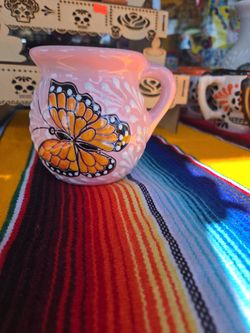 Taza  Mariposa ($5) tel (contact info removed)