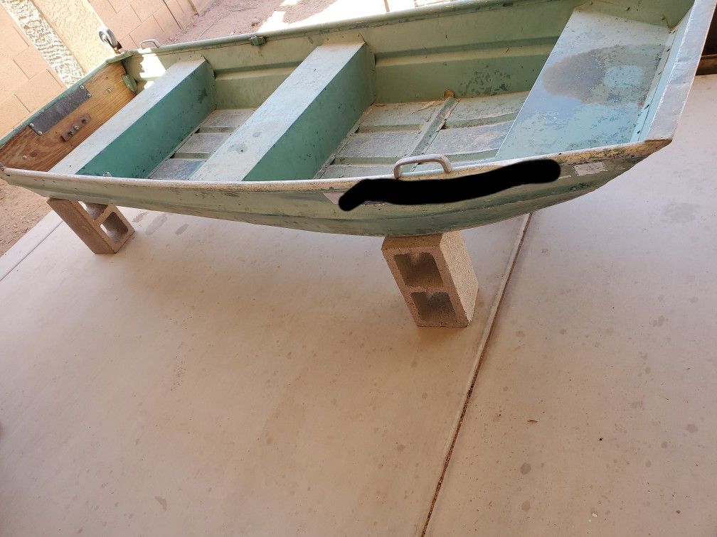 12 ft aluminum boat, have papers but not up to date