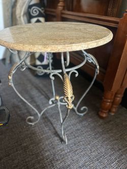 2 marble top tables