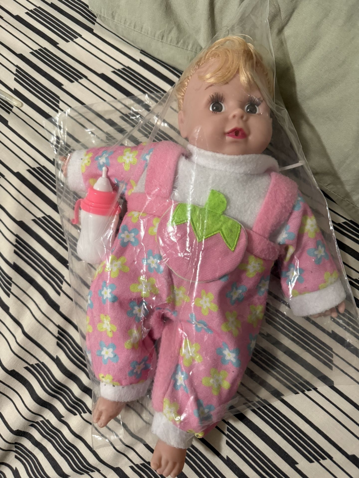 Baby Doll with musical bottle