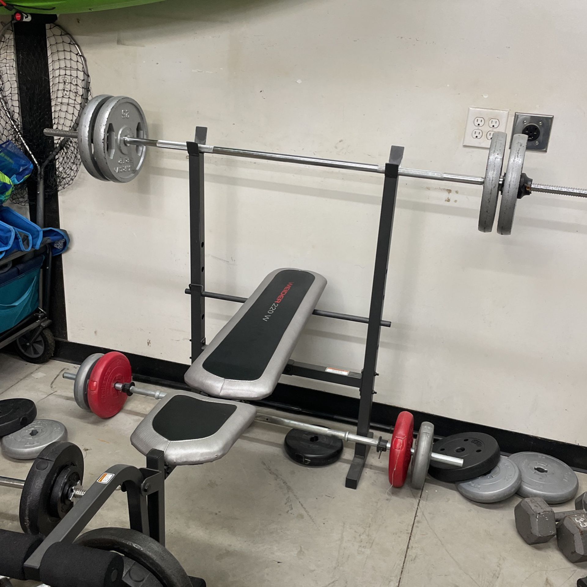 Press bench With The Bar And Weights 
