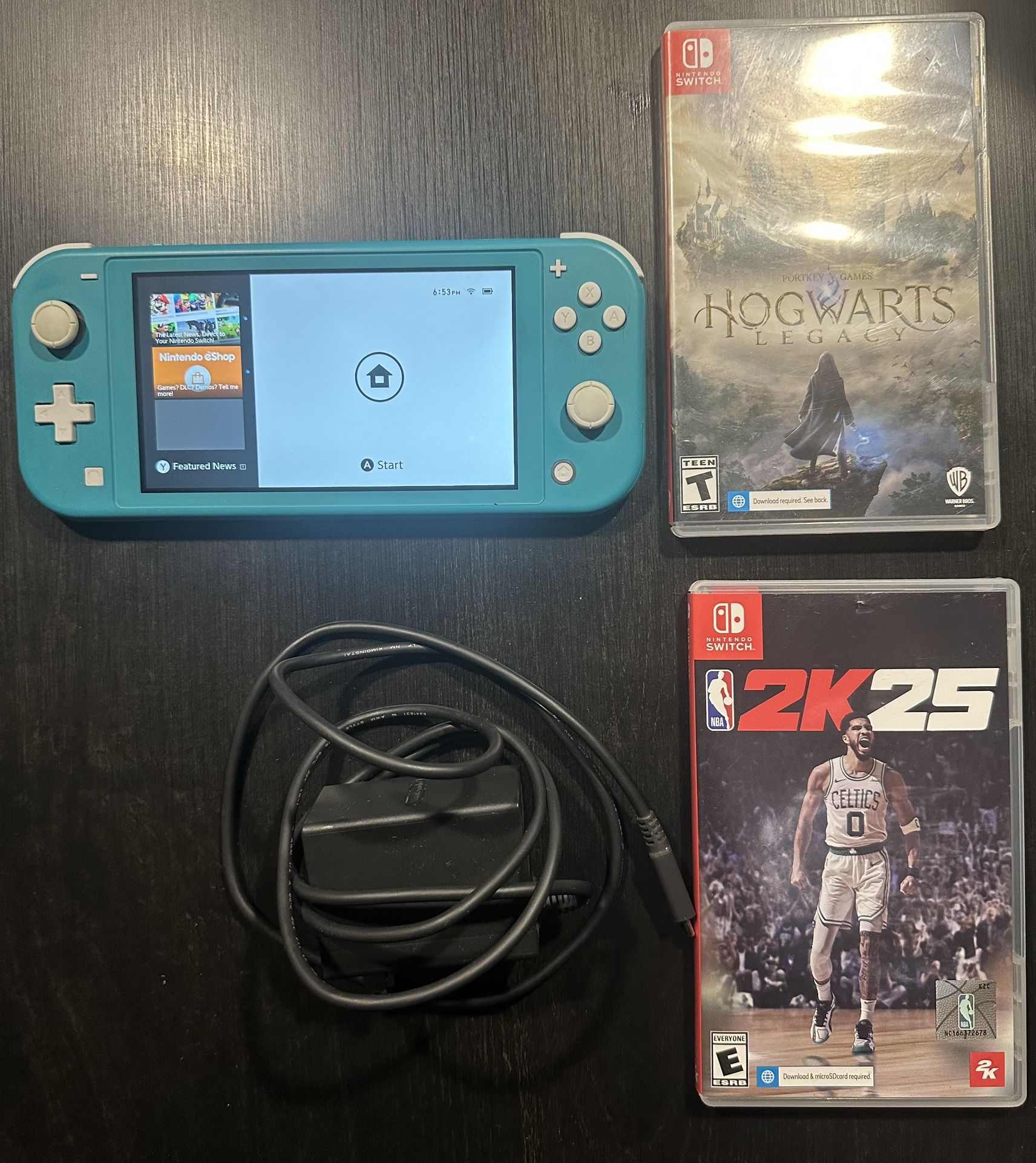 Nintendo Switch turquoise with Hogwarts Legacy and NBA 2k25