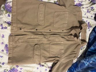 Khaki color tear jacket never worn