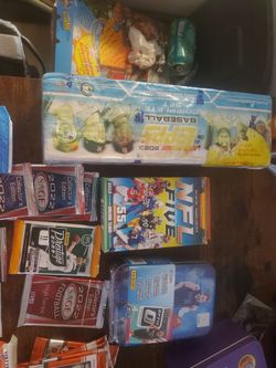Unopened packs assorted sports cards