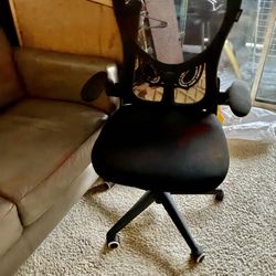 Black Office/ Home Chair perfect for office space or home lounging!