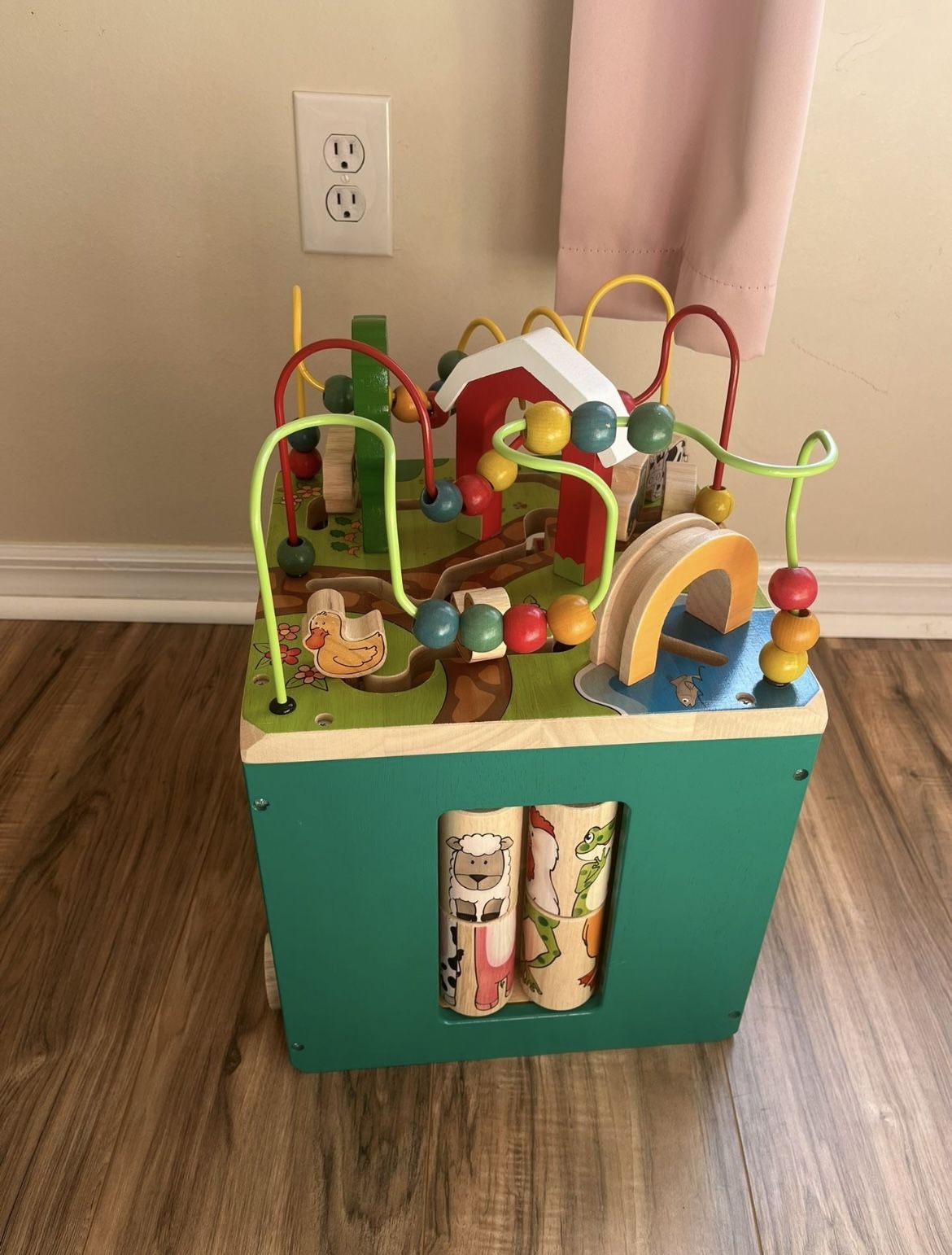 Wooden activity cube with farm theme