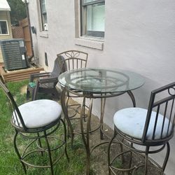 Outdoor dining set with three chairs