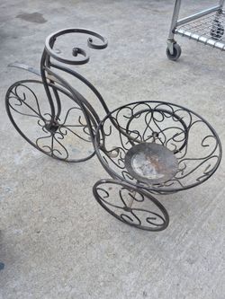 Wrought iron plant holder