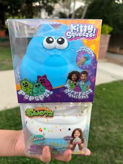 Jumbo kitty squeeze and cupcake squishy