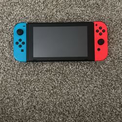 Nintendo Switch with Neon Blue and Neon Red Joy-Con