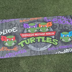 Teenage Mutant Ninja Turtles TMNT Vinyl Banner.     Excellent Condition.                              Measures  71 x 36