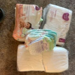 Different brand size 2 diapers