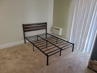 Bed frame and desk