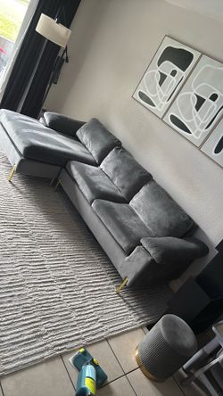 Grey section couch & ottoman