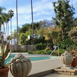 A Pair Of Garden Decors