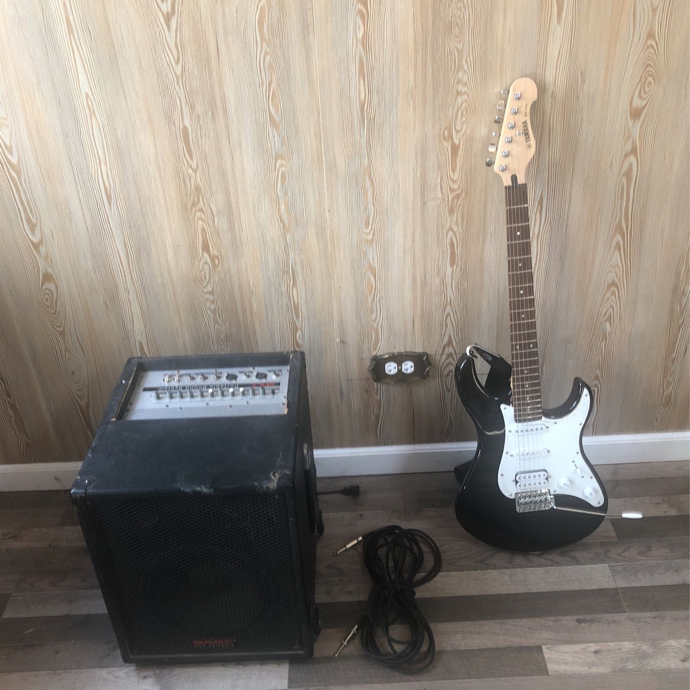 Guitar and Portable Sound System 