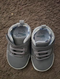 Grey newborn shoes and neon yellow/grey shoes $5 each