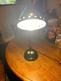 Tinted titanium plated desk lamp adjustable in two places excellent condition $25