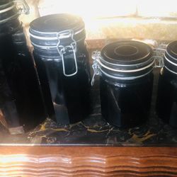 Set Of Black Glass Four Piece Canister Set With Seals Great Condition