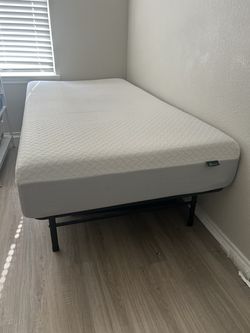 Twin size bed with iron frame