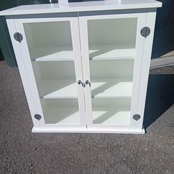 Two glass doors wooden cabinet 26"x9.5"x27" tall