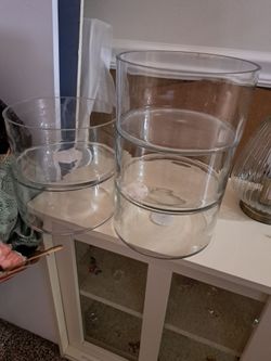 5 glass cylinders