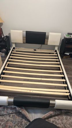 Luxury Upholstered Platform Bed Frame with Mirror Stainless Decoration, Modern Design, Top Faux Leather Finish, Curved Headboard, Wooden Slats Support