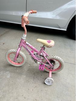 Kids bike with removable training wheels