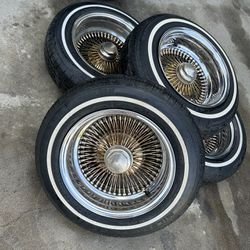 4 WIRE WHEEL TIRES (SERIOUS BUYERS ONLY)