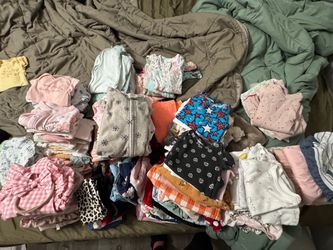 Baby girl clothes & nursing pillow