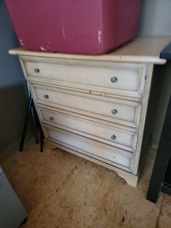 small dresser two knobs missing