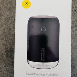 Small Desktop Humidifier (Model J04, Black) with the following specifications and details shown on the packaging:  * Product Name: Small De