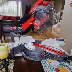 Milwaukee FUEL 18V 10 in. Lithium-Ion Brushless Cordless Dual Bevel Sliding Compound Miter Saw (Tool-Only -It is sold as seen in the photo.