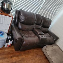 electric reclining loveseat with center storage USB charging and cupholders