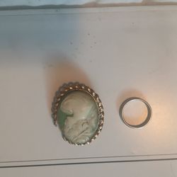 Silver ring and antique broach