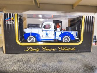 This is a 1940 Ford Pickup die-cast collectible truck.
