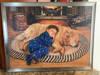 Frame With Puzzle Of A Boy And A Dog