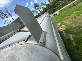 Custom enclosed trailer with roof rack.
