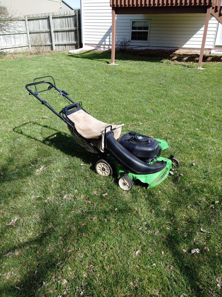 Lawn-Boy 2-cycle lawn mower with bag and all accessories
