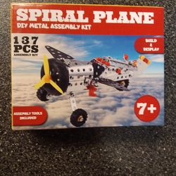 SPIRAL AIR PLANE. 137 PEICES. ALL TOOLS INCLUDED IN THE BOX.  NEVER OPENED 