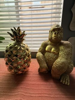 Gold pineapple and gorilla decor