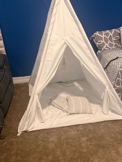 Kids play teepee