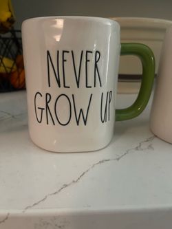 Rae Dunn Mug “ never grow up”