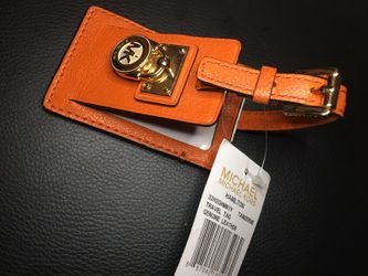 Michael kors ORANGE info luggage charm